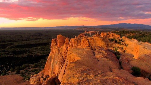 Sandstone outcropping with pink sunset